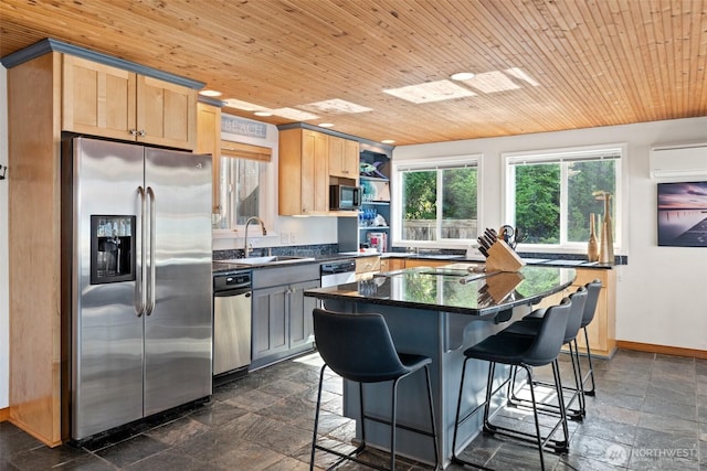 9451 E State Route 106, Union, WA 98592 - kitchen with stainless steel refrigerator with ice dispenser, a sink, dark countertops, light brown cabinetry, and stone tile flooring