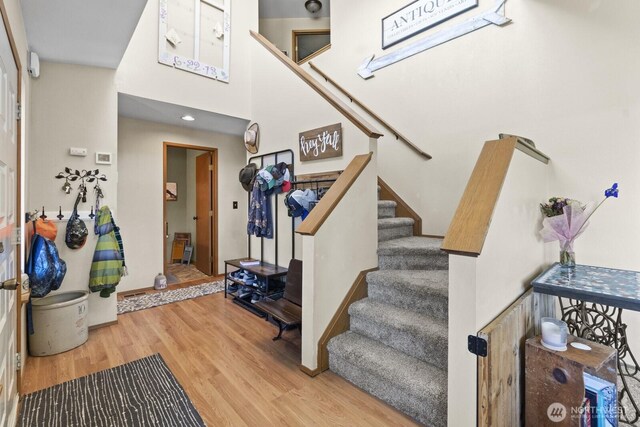 11420 232nd Avenue Ct E, Buckley, WA 98321 - entrance foyer featuring wood finished floors, stairway, and baseboards