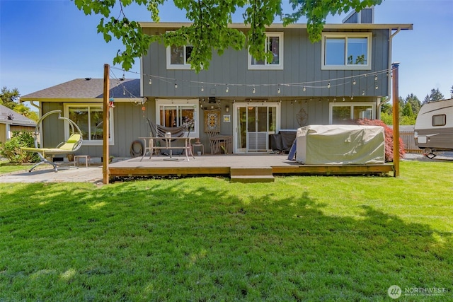 11420 232nd Avenue Ct E, Buckley, WA 98321 - rear view of house with a wooden deck and a lawn