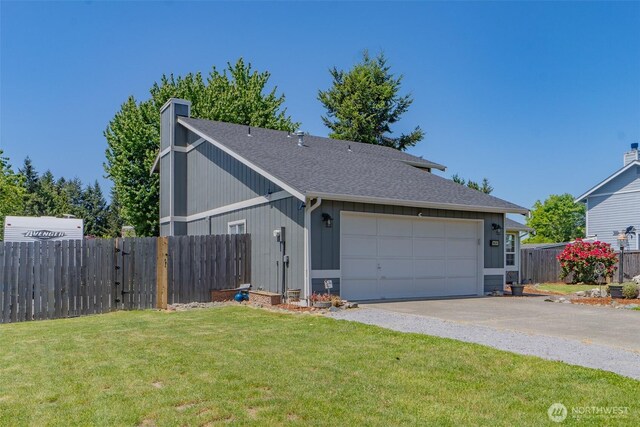 11420 232nd Avenue Ct E, Buckley, WA 98321 - view of side of home with roof with shingles, a garage, and a chimney