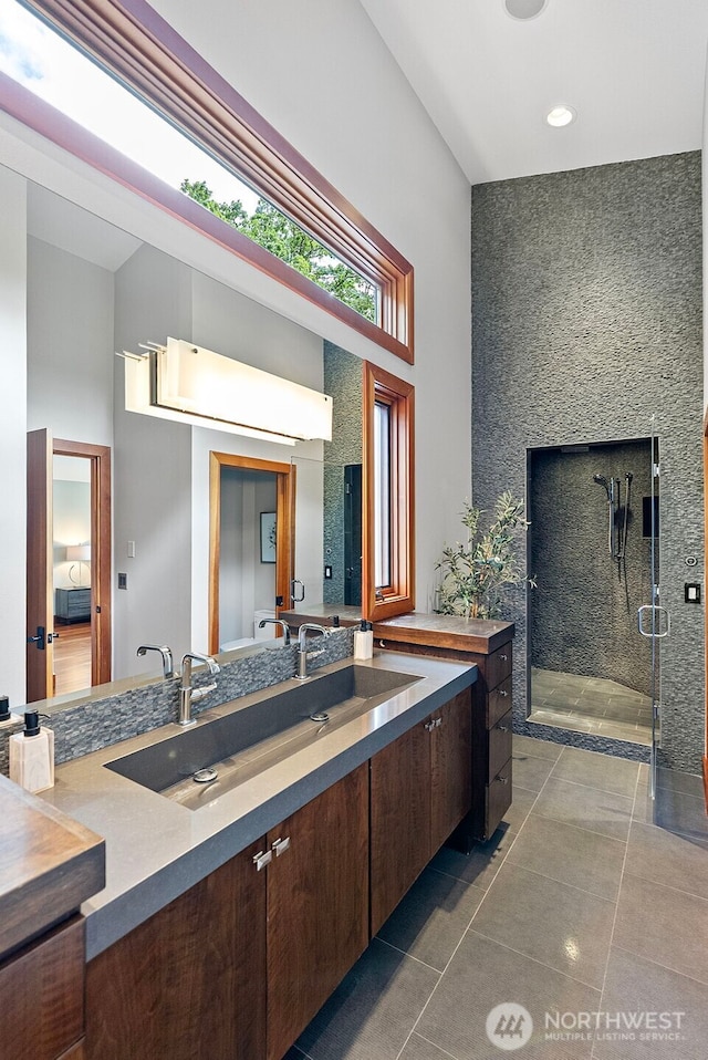 7708 Walnut St SW, Lakewood, WA 98498 - full bath with tile patterned flooring, vanity, a shower stall, and recessed lighting