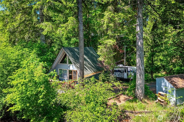1741 NE Tahuya River Dr, Tahuya, WA 98588 - view of side of home with a forest view
