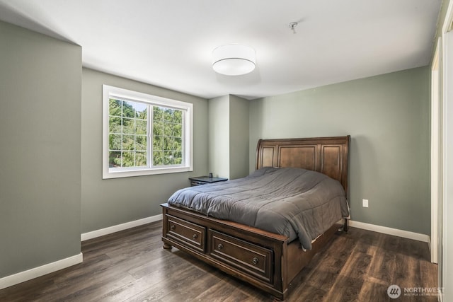 13629 26th Pl W Unit B104, Lynnwood, WA 98087 - bedroom featuring baseboards and dark wood finished floors