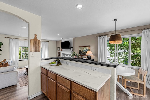1324 Fairhaven Ave, Wenatchee, WA 98801 - kitchen featuring open floor plan, dark wood-style flooring, a peninsula, and recessed lighting