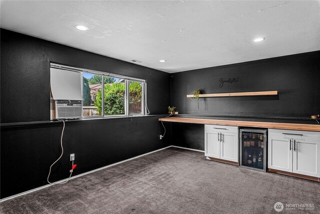 1324 Fairhaven Ave, Wenatchee, WA 98801 - bar featuring wine cooler, carpet flooring, recessed lighting, cooling unit, and baseboards