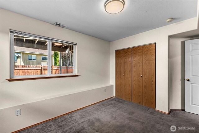 1324 Fairhaven Ave, Wenatchee, WA 98801 - unfurnished bedroom with carpet flooring, a closet, and baseboards