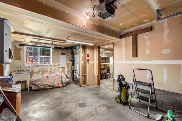 1324 Fairhaven Ave, Wenatchee, WA 98801 - garage with a garage door opener and a sink