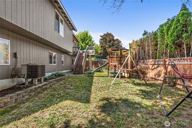 1324 Fairhaven Ave, Wenatchee, WA 98801 - view of yard with central air condition unit, a playground, stairway, and a deck