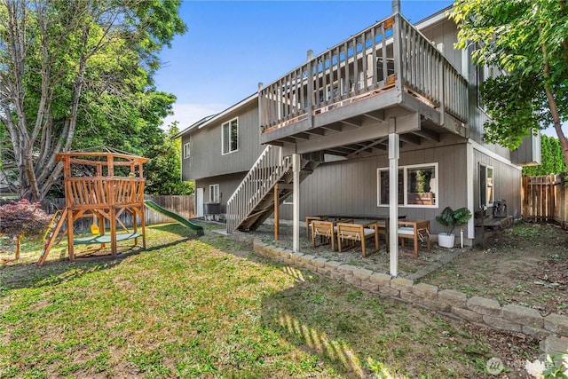 1324 Fairhaven Ave, Wenatchee, WA 98801 - rear view of property with a playground, a wooden deck, and stairway