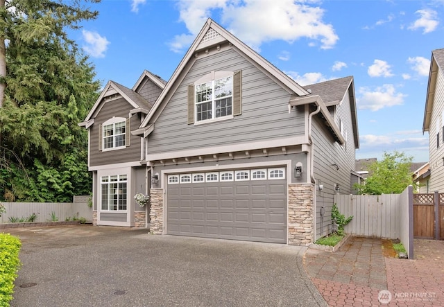 13327 SE 279th Pl, Kent, WA 98042 - view of front of home featuring stone siding, driveway, and a garage