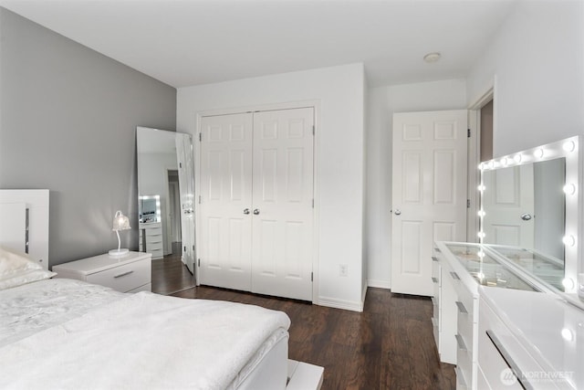 13327 SE 279th Pl, Kent, WA 98042 - bedroom featuring dark wood-type flooring, a closet, and baseboards