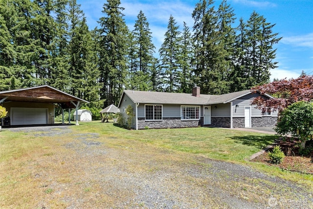 15412 SE 304th Pl, Kent, WA 98042 - ranch-style home featuring stone siding, a chimney, a front yard, driveway, and a garage