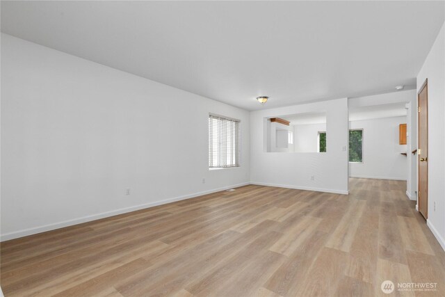 4817 SE 147th Pl, Everett, WA 98208 - unfurnished room featuring light wood-style floors and baseboards