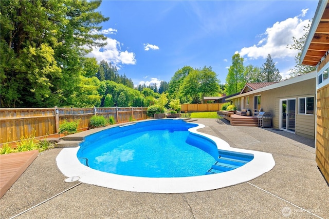 26933 NE Cherry St, Duvall, WA 98019 - view of pool featuring a patio area, a fenced backyard, outdoor lounge area, and a grill