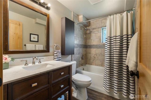 26933 NE Cherry St, Duvall, WA 98019 - bathroom with toilet, vanity, wood finished floors, and shower / bathtub combination with curtain