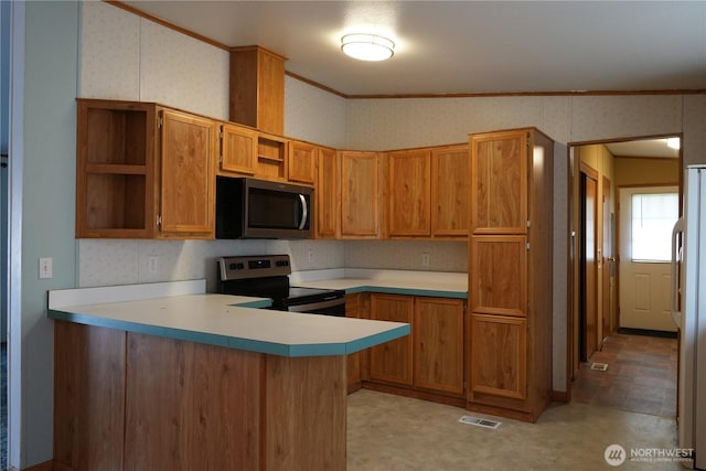 10711 62nd St E Unit 81A, Puyallup, WA 98372 - kitchen with stainless steel appliances, open shelves, wallpapered walls, a peninsula, and light countertops