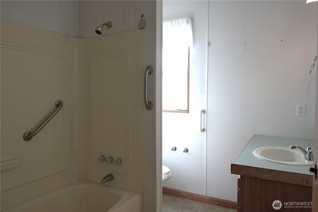 10711 62nd St E Unit 81A, Puyallup, WA 98372 - full bath featuring vanity, toilet,  shower combination, and tile patterned flooring