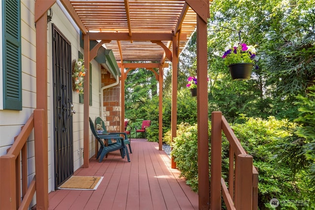 7755 NE Seawind Ave, Poulsbo, WA 98370 - wooden deck featuring a pergola