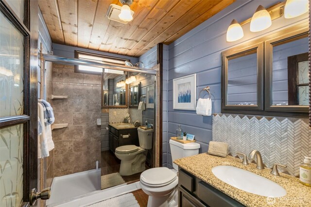 7755 NE Seawind Ave, Poulsbo, WA 98370 - bathroom with toilet, wooden ceiling, vanity, a shower stall, and decorative backsplash