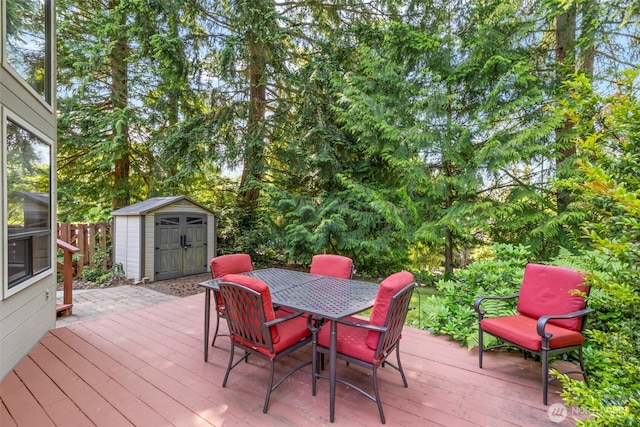 7755 NE Seawind Ave, Poulsbo, WA 98370 - wooden deck featuring outdoor dining area