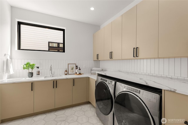 7116 NE 119th Ln, Kirkland, WA 98034 - laundry area with washing machine and dryer, cabinet space, light tile patterned floors, and recessed lighting