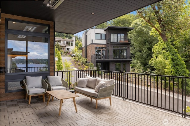 7116 NE 119th Ln, Kirkland, WA 98034 - view of patio / terrace with a balcony, a water view, and an outdoor hangout area