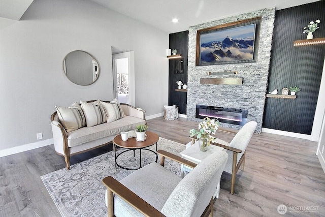 1630 Hillcrest Ave, Enumclaw, WA 98022 - living area featuring baseboards, a stone fireplace, wood finished floors, and recessed lighting