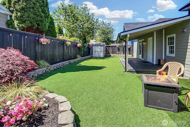 1630 Hillcrest Ave, Enumclaw, WA 98022 - view of yard with an outdoor fire pit