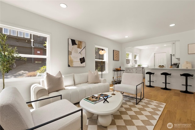 2614 E Olive St, Seattle, WA 98122 - living area with light wood-style flooring and recessed lighting