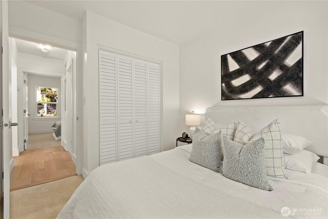 2614 E Olive St, Seattle, WA 98122 - bedroom featuring a closet and wood finished floors