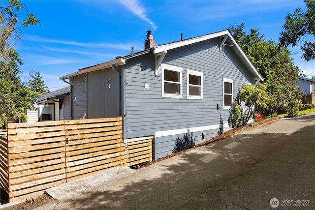 2614 E Olive St, Seattle, WA 98122 - view of home's exterior featuring a chimney
