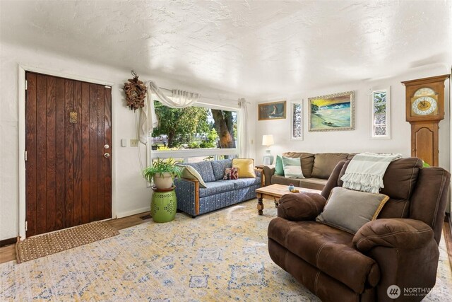 221 NW Nichols Ave, Bremerton, WA 98311 - living area featuring wood finished floors and baseboards