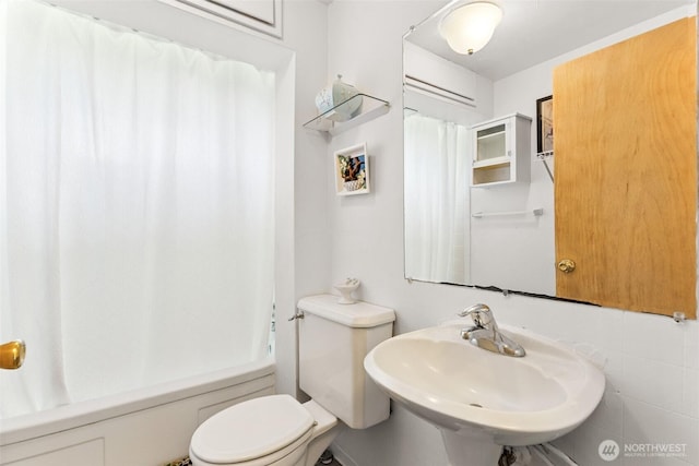 221 NW Nichols Ave, Bremerton, WA 98311 - bathroom featuring a sink, toilet, and shower / tub combo with curtain