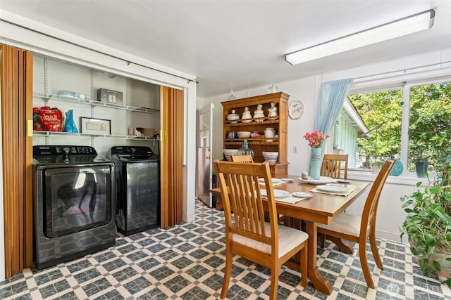 221 NW Nichols Ave, Bremerton, WA 98311 - dining space with separate washer and dryer and tile patterned floors