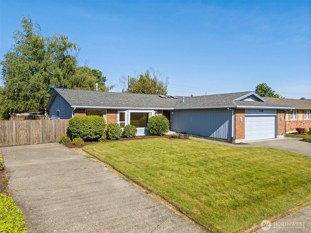 6410 151st Ave E, Sumner, WA 98390 - single story home featuring driveway, brick siding, an attached garage, and a shingled roof