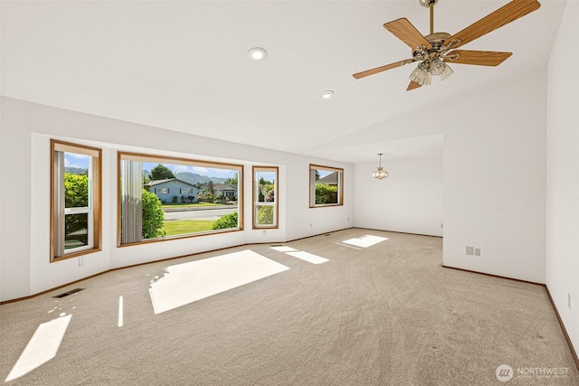 6410 151st Ave E, Sumner, WA 98390 - carpeted spare room with lofted ceiling, baseboards, and recessed lighting