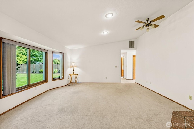 6410 151st Ave E, Sumner, WA 98390 - carpeted empty room featuring baseboards, a ceiling fan, and lofted ceiling