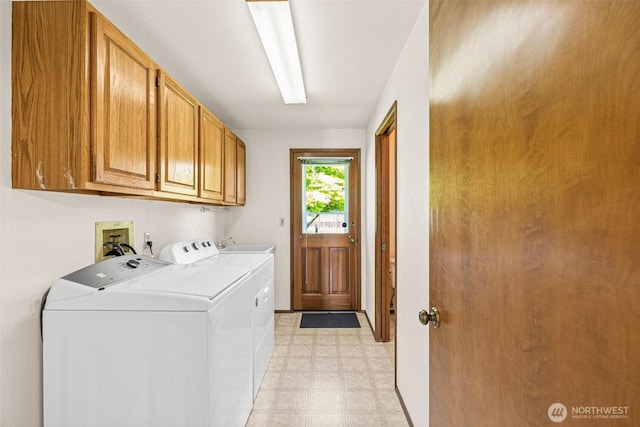 6410 151st Ave E, Sumner, WA 98390 - washroom with cabinet space, washing machine and clothes dryer, and light floors