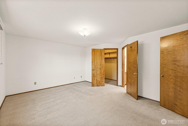 6410 151st Ave E, Sumner, WA 98390 - unfurnished bedroom with light colored carpet and baseboards