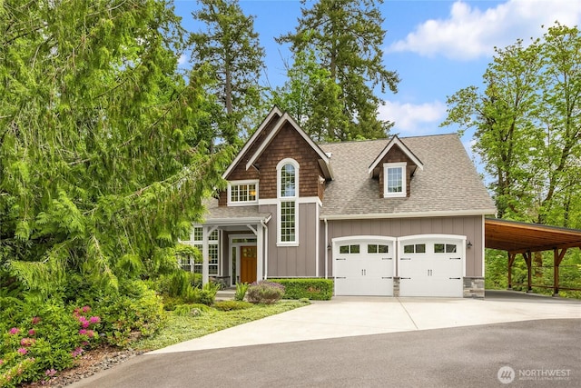 3029 Yankee Girl Cir NE, Bainbridge Island, WA 98110 - shingle-style home with board and batten siding, roof with shingles, driveway, and a garage