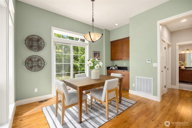 3029 Yankee Girl Cir NE, Bainbridge Island, WA 98110 - dining room with light wood-style flooring, baseboards, and recessed lighting