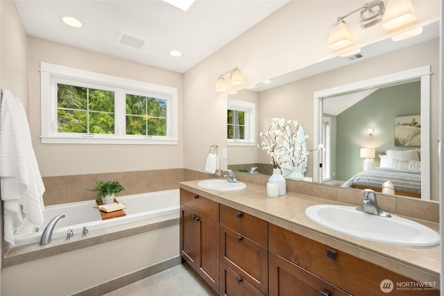 3029 Yankee Girl Cir NE, Bainbridge Island, WA 98110 - bathroom featuring ensuite bath, double vanity, and a garden tub