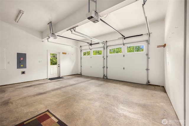 3029 Yankee Girl Cir NE, Bainbridge Island, WA 98110 - garage featuring electric panel and a garage door opener