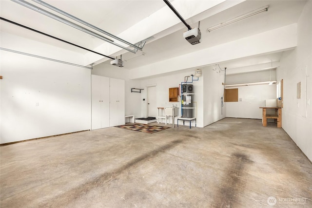 3029 Yankee Girl Cir NE, Bainbridge Island, WA 98110 - garage featuring a garage door opener and heat pump water heater