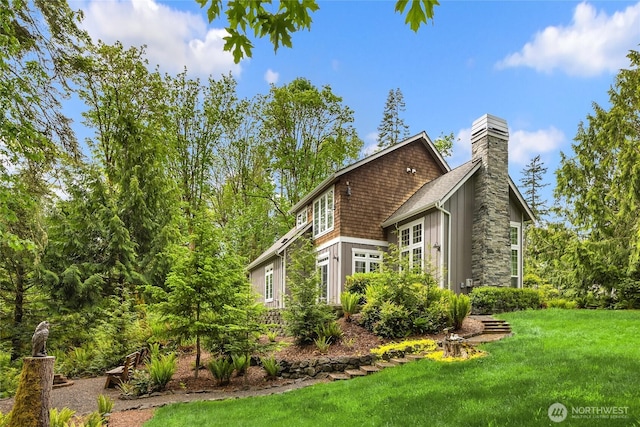 3029 Yankee Girl Cir NE, Bainbridge Island, WA 98110 - view of side of property with a chimney and a yard