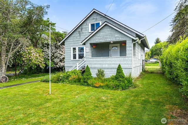 1102 Tecumseh St, Aberdeen, WA 98520 - view of front facade featuring a front lawn and covered porch