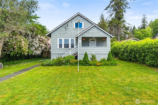 1102 Tecumseh St, Aberdeen, WA 98520 - view of front of house with a front lawn and covered porch