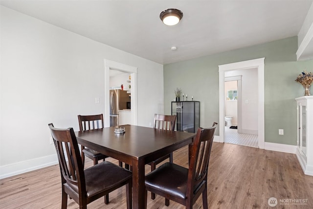 1102 Tecumseh St, Aberdeen, WA 98520 - dining space featuring light wood-style floors and baseboards