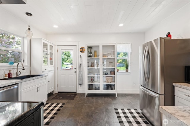 1102 Tecumseh St, Aberdeen, WA 98520 - kitchen with a sink, appliances with stainless steel finishes, white cabinets, light countertops, and wooden ceiling