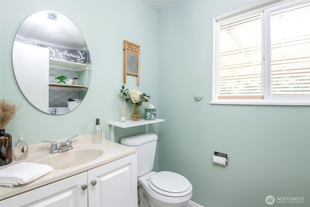 5907 N 31st St, Tacoma, WA 98407 - bathroom featuring toilet, plenty of natural light, and vanity